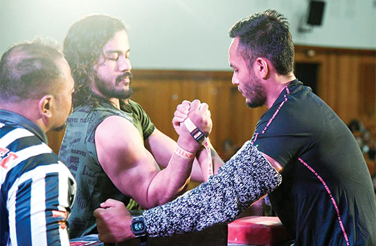 Ha u ïaïong yn pynlong ka MAWA ïa ka rynsan ïakhun kti ha ka nongbah arm-wrestling
